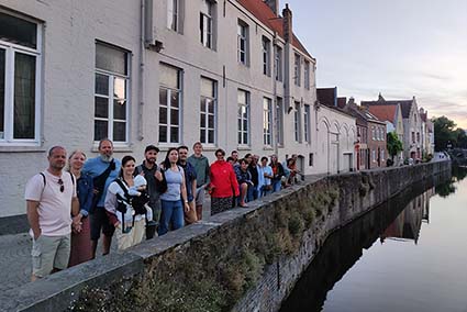 Alternative Bruges at Night Walking Tour by Ambassadors Tours Group Photo at Goudenhandrei